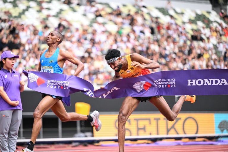 First-ever Tanzanian gold as Simbu dips past Petros in world marathon