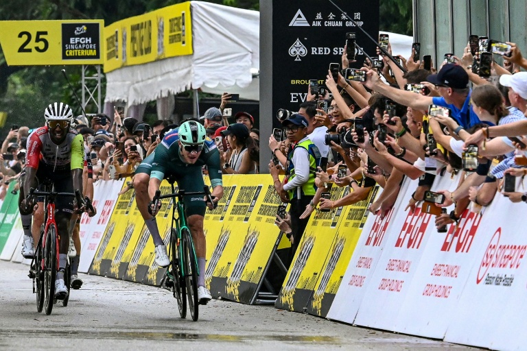 Tricky conditions: Jonathan Milan wins wet Tour de France Singapore Criterium
