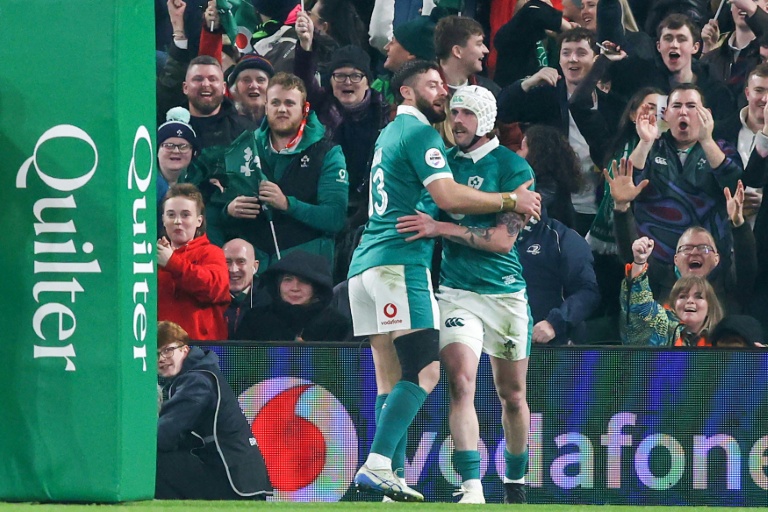 Rugby: Hansen hat-trick inspires Irish to record win over Australia